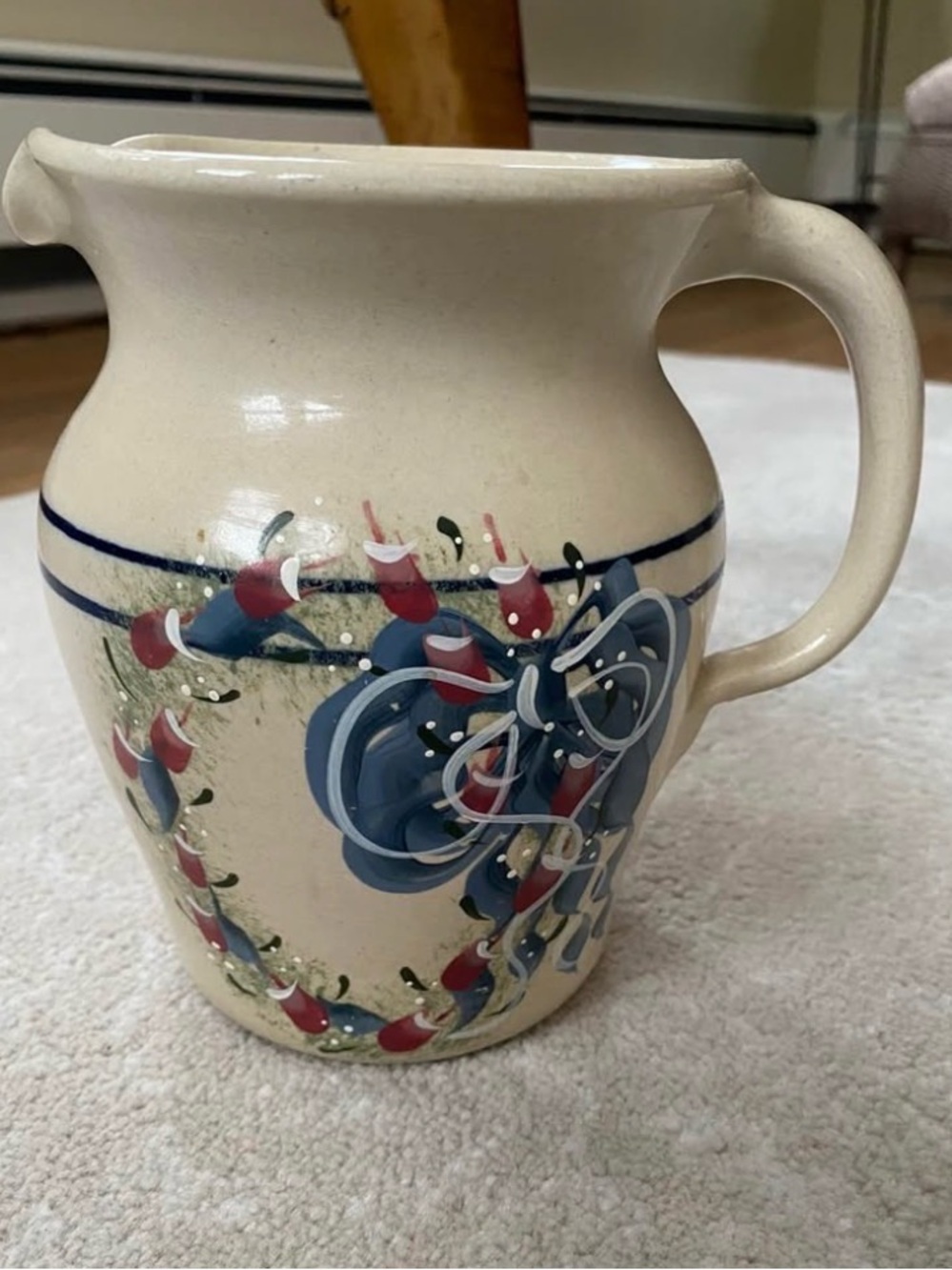 Hand-Painted Cream Ceramic Pitcher with Blue Floral Design